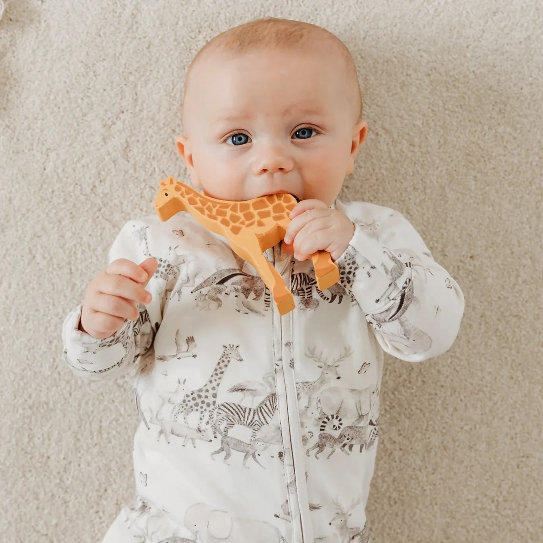 Fox and Lottie organic cotton and bamboo newborn baby sleepsuit with animal print, a newborn essential at KIDDYKIND