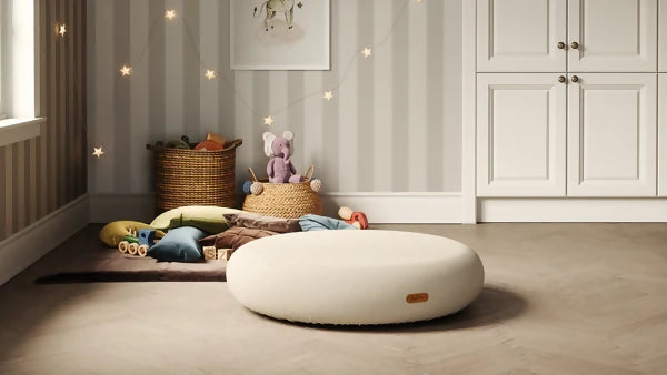 Calm natural nursery with wooden furniture, soft textiles and wooden toys - how to create a PFAS-free nursery room by room UK | Kiddykind