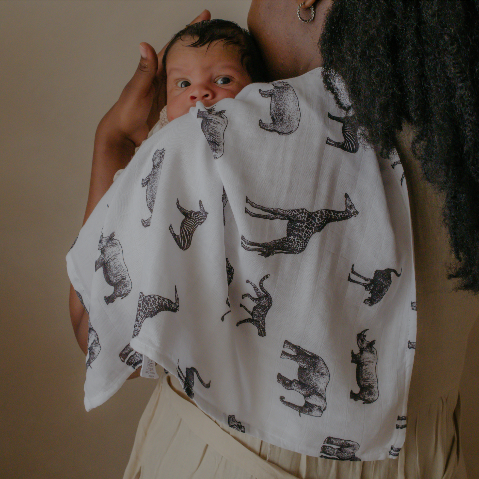 Safari Print Baby Muslin Swaddle (120x120cm) by Sustainabub, organic cotton, vetted by KIDDYKIND