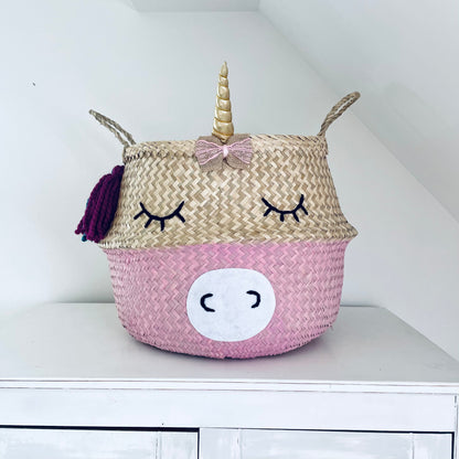 Handwoven seagrass unicorn storage basket with rainbow hair and horn