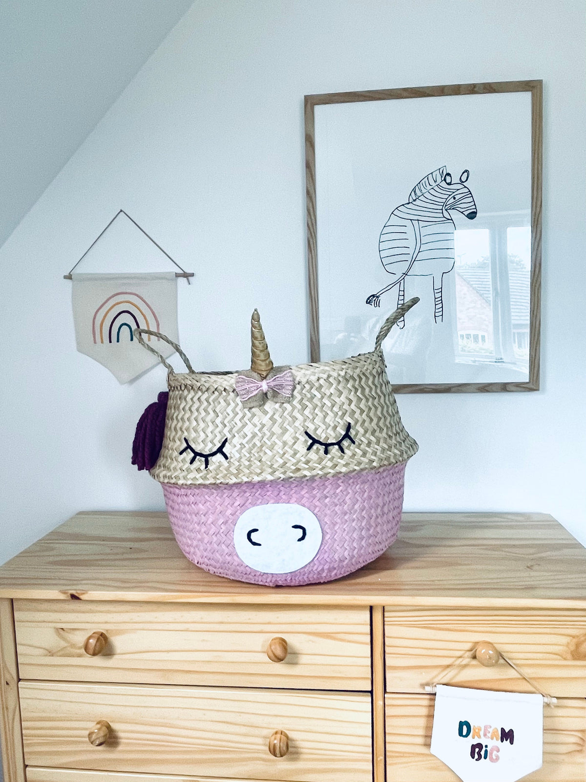 Handwoven seagrass unicorn storage basket with rainbow hair and horn, view 4