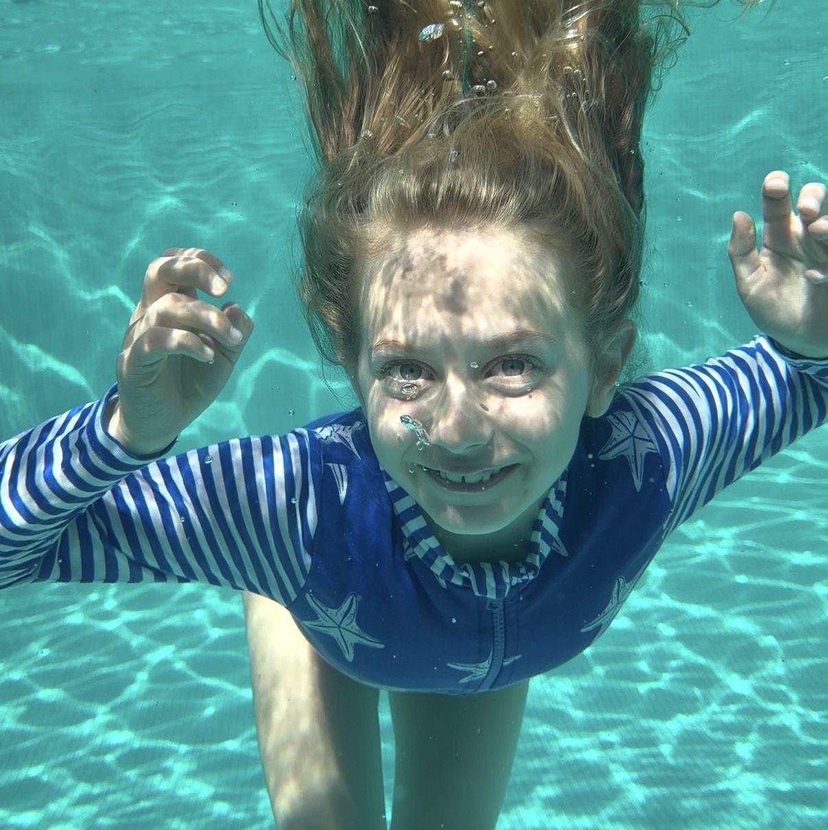 Long Sleeve Swimming Costume Blue close up - organic cotton kids swimwear sustainable UK | Kiddykind