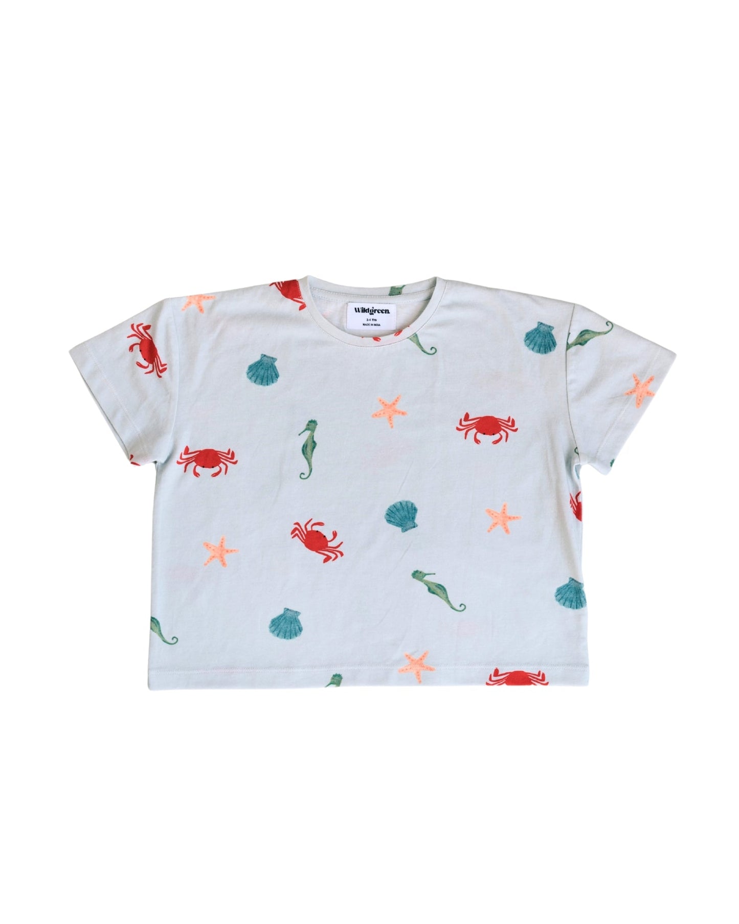 Wildgreen’s Marine T-shirt, a gender-neutral kids' tee made from 100% GOTS-certified organic cotton. Featuring an ocean-inspired print, this sustainable and eco-friendly piece is perfect for conscious families. #OrganicKidswear #SustainableFashion #EthicalClothing