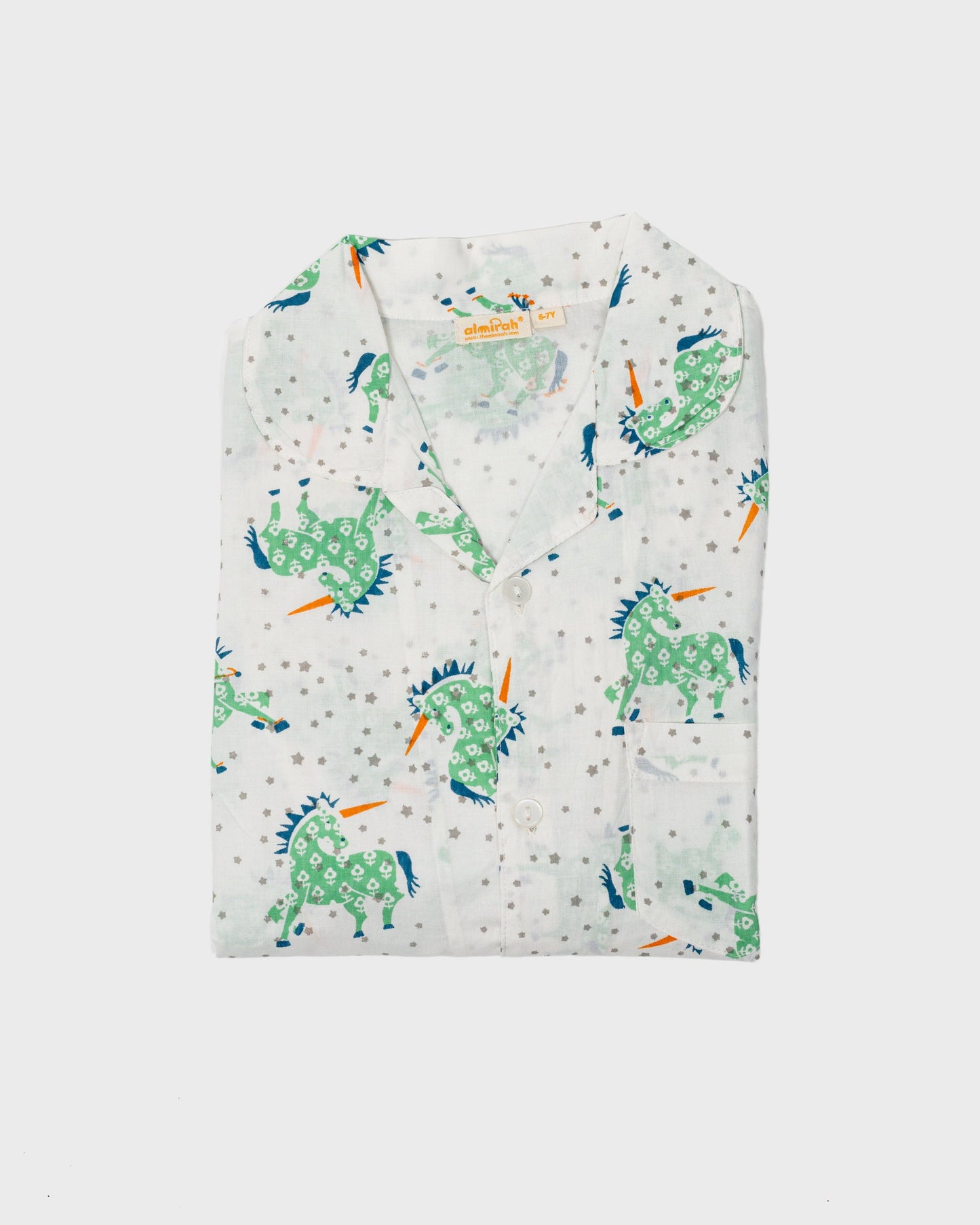 Organic baby bedding: Girls & Boys Cotton Pyjamas in Green Unicorn Print | KIDDYKIND