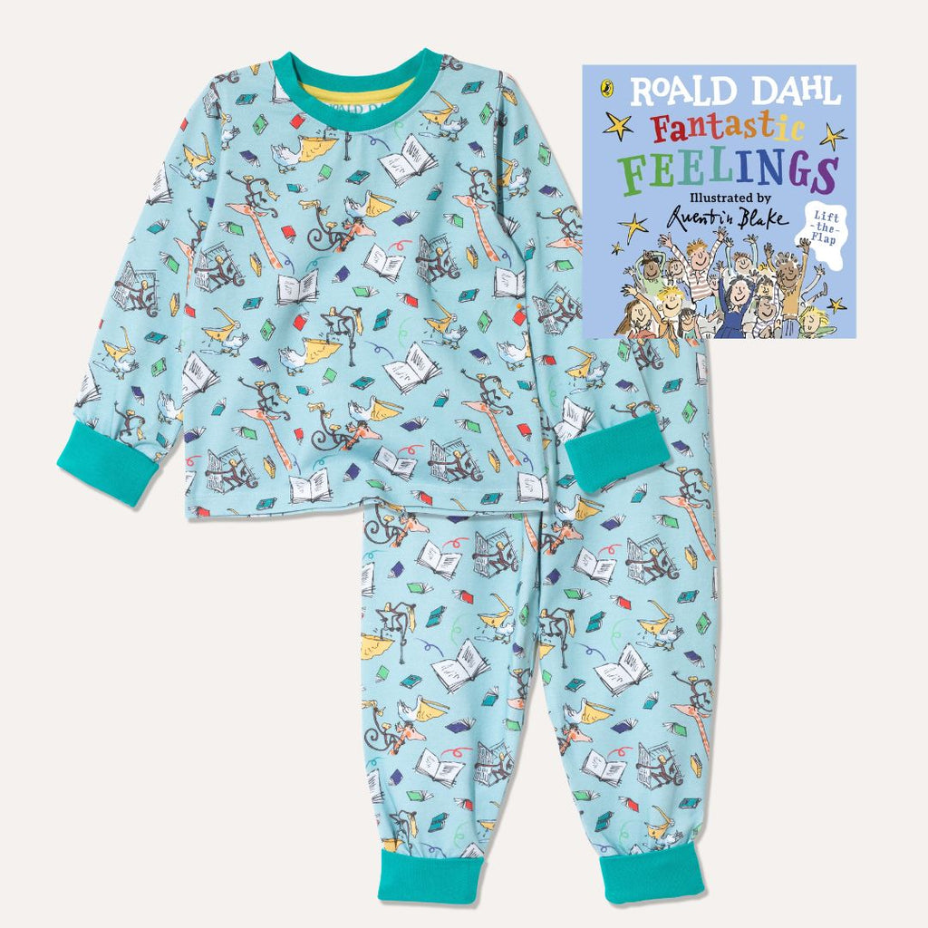Image of Roald Dahl's 'Fantastic Feelings' board book alongside a pair of Ducky Zebra x Roald Dahl aqua pyjamas with the animals from the Giraffe and the Pelly and Me leaping out of books