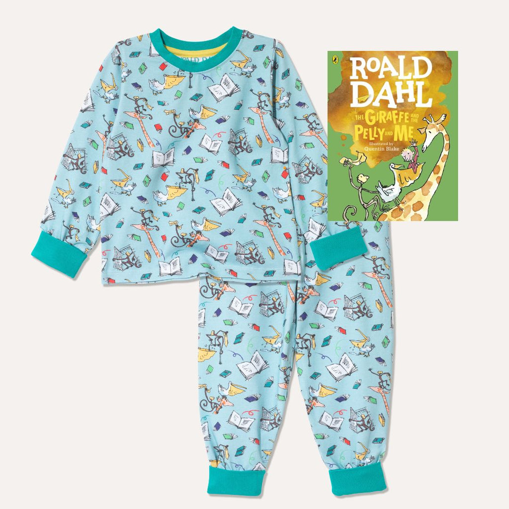 Image of the Giraffe and the Pelly and Me book alongside a pair of Ducky Zebra x Roald Dahl aqua pyjamas with the animals from the Giraffe and the Pelly and Me leaping out of books