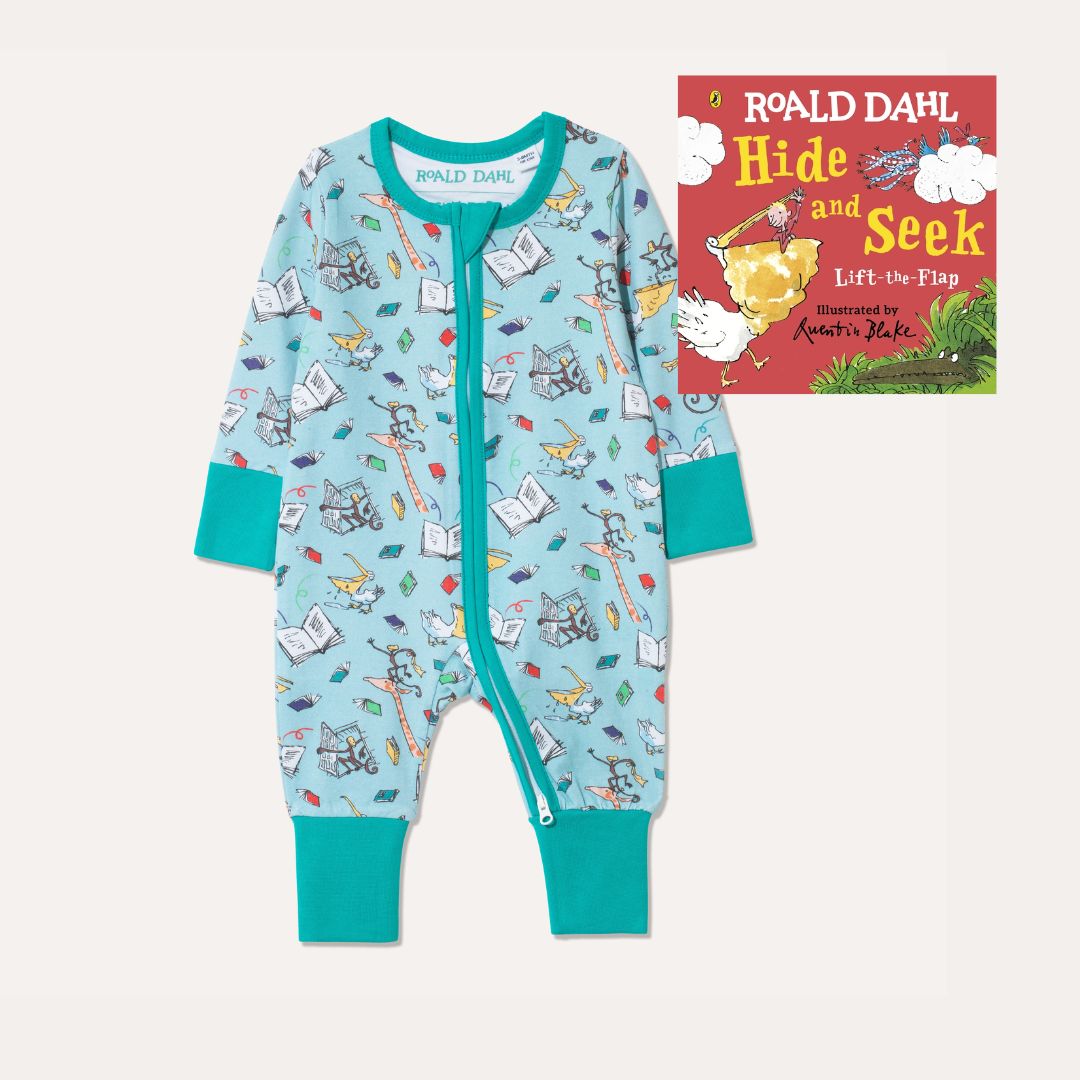 Image of Roald Dahl's 'Hide and Seek' Board Book alongside Ducky Zebra's Roald Dahl aqua Zip-up Sleepsuit with a fun print, featuring animals from 'The Giraffe and the Pelly and Me'.