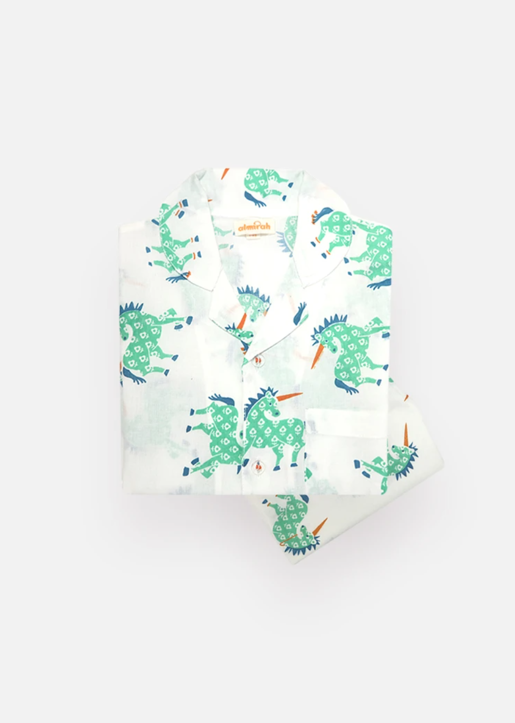 Organic baby bedding: Girls & Boys Cotton Pyjamas in Green Unicorn Print | KIDDYKIND