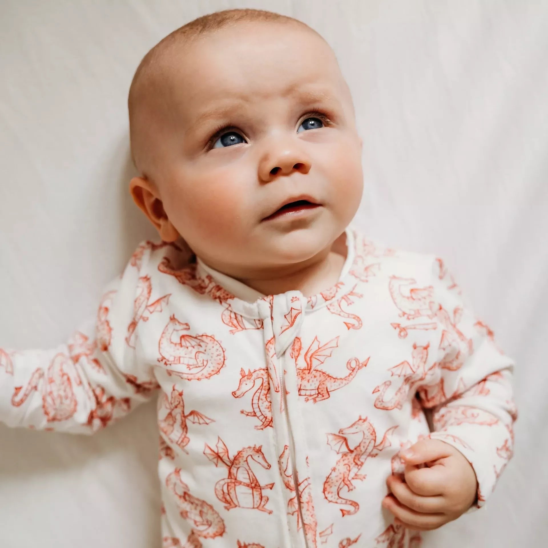 Natural organic cotton baby sleepsuit uk