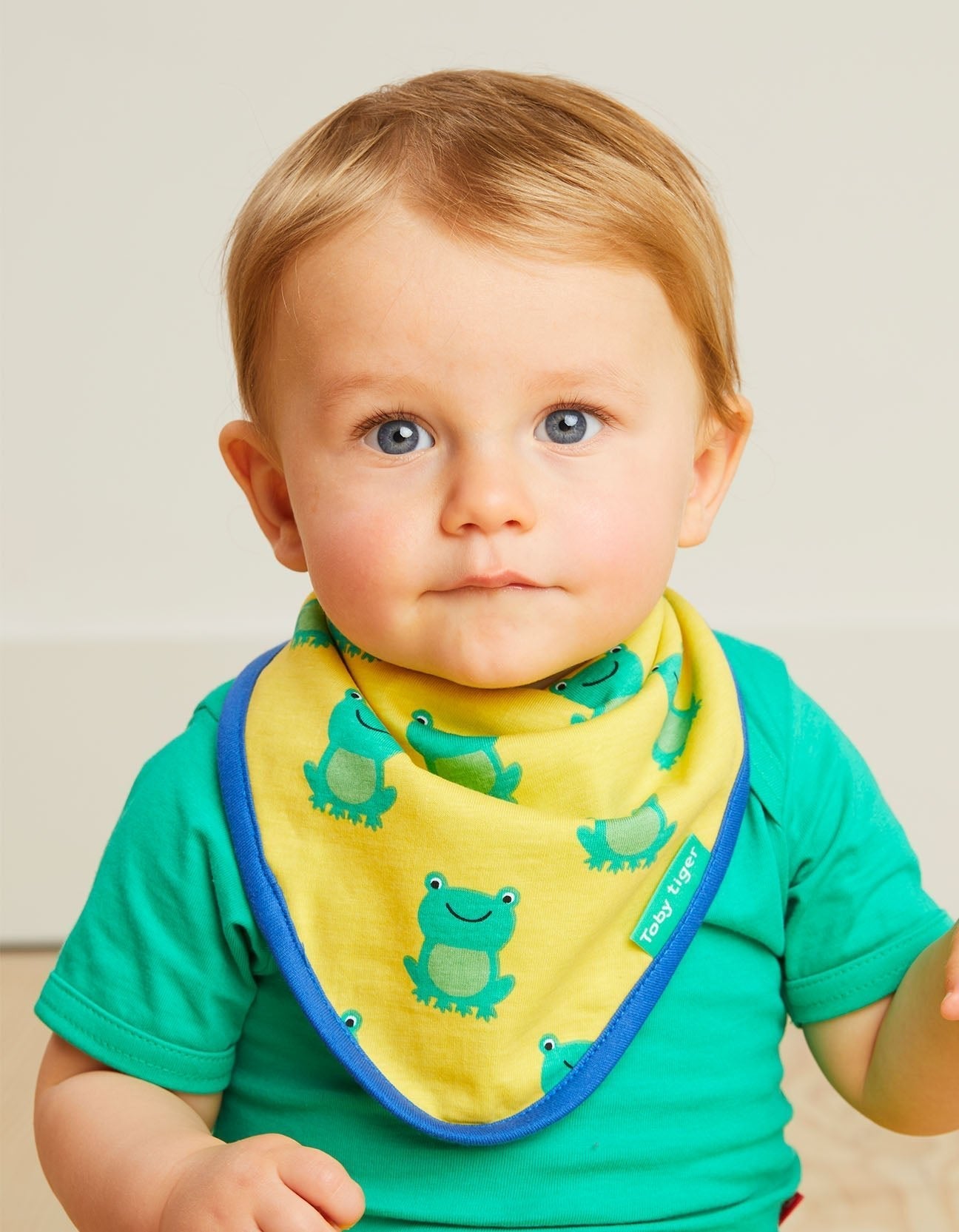 Conscious baby essentials: Organic Frog Print Dribble Bib | KIDDYKIND