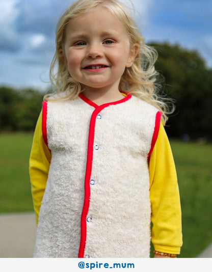Luxury ethical baby: Organic Bold Floral Reversible Gilet | KIDDYKIND UK