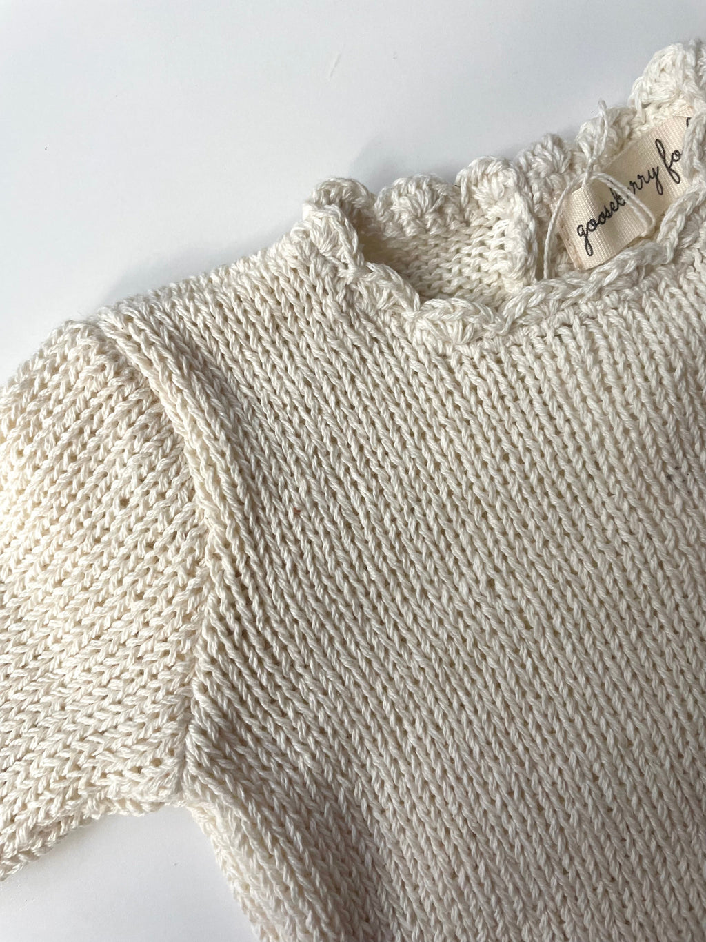 Organic cotton scallop baby sweater