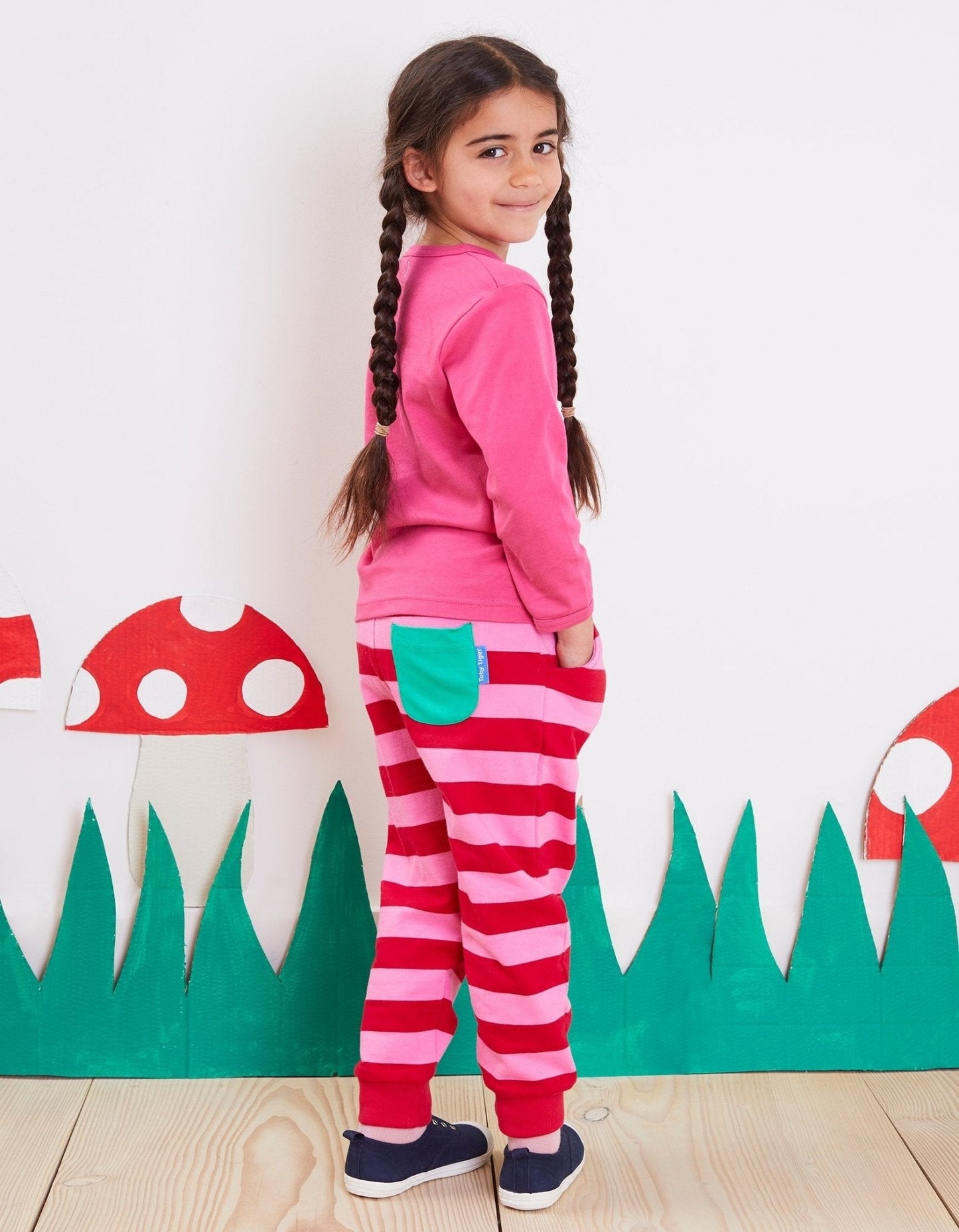Organic Red Pink Striped Joggers by Toby Tiger, GOTS-certified, vetted by KIDDYKIND
