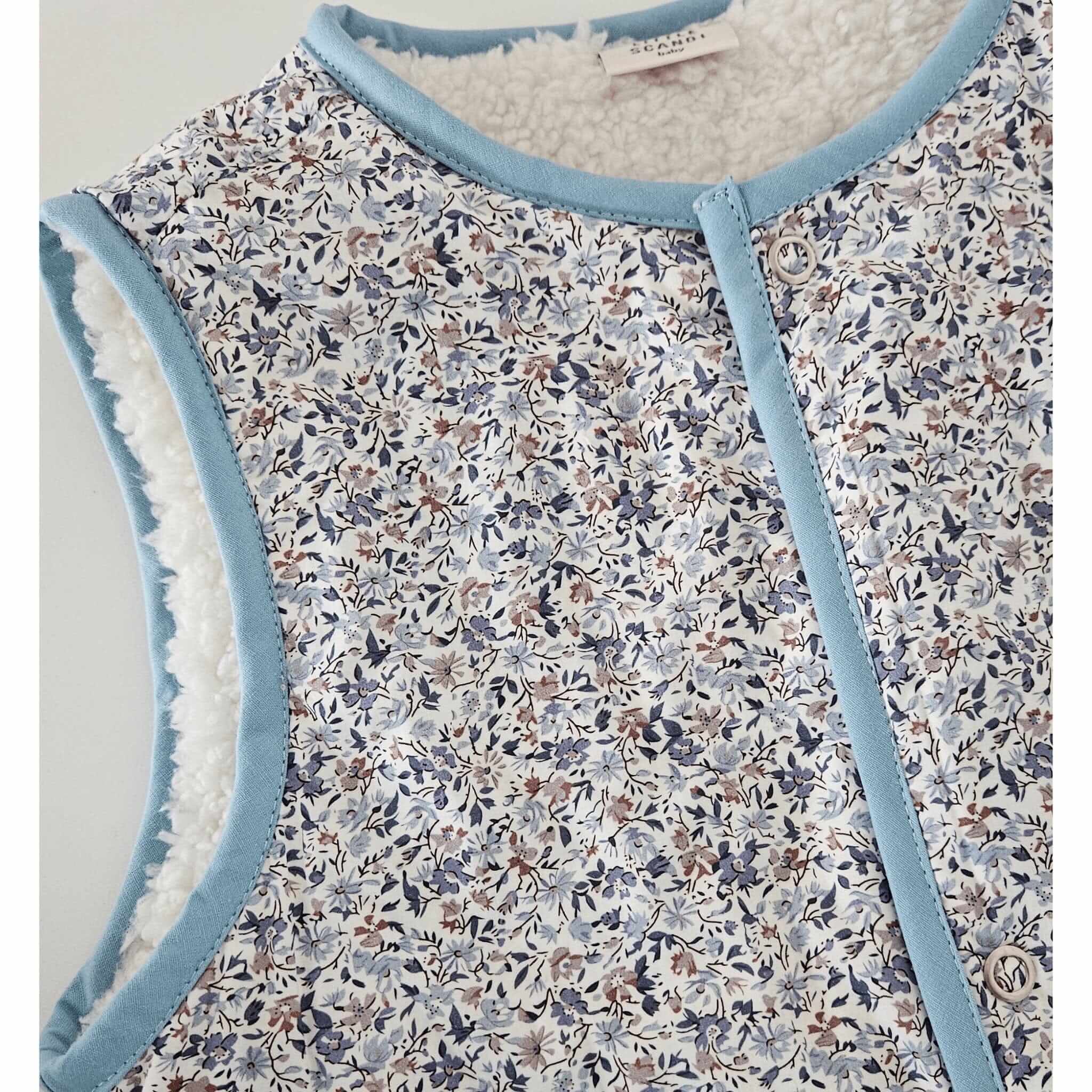 Kids Stylish - Poppy Leafy Vest design - Gilet Outerwear Clothing Sleeveless Vest Warm Vest Scandi Stylish - Chest Close up on vest - Little Scandi baby