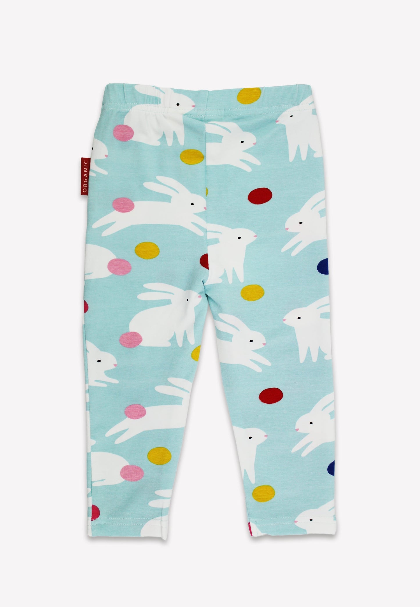 Children's leggings with bunny and egg pattern on a light blue background