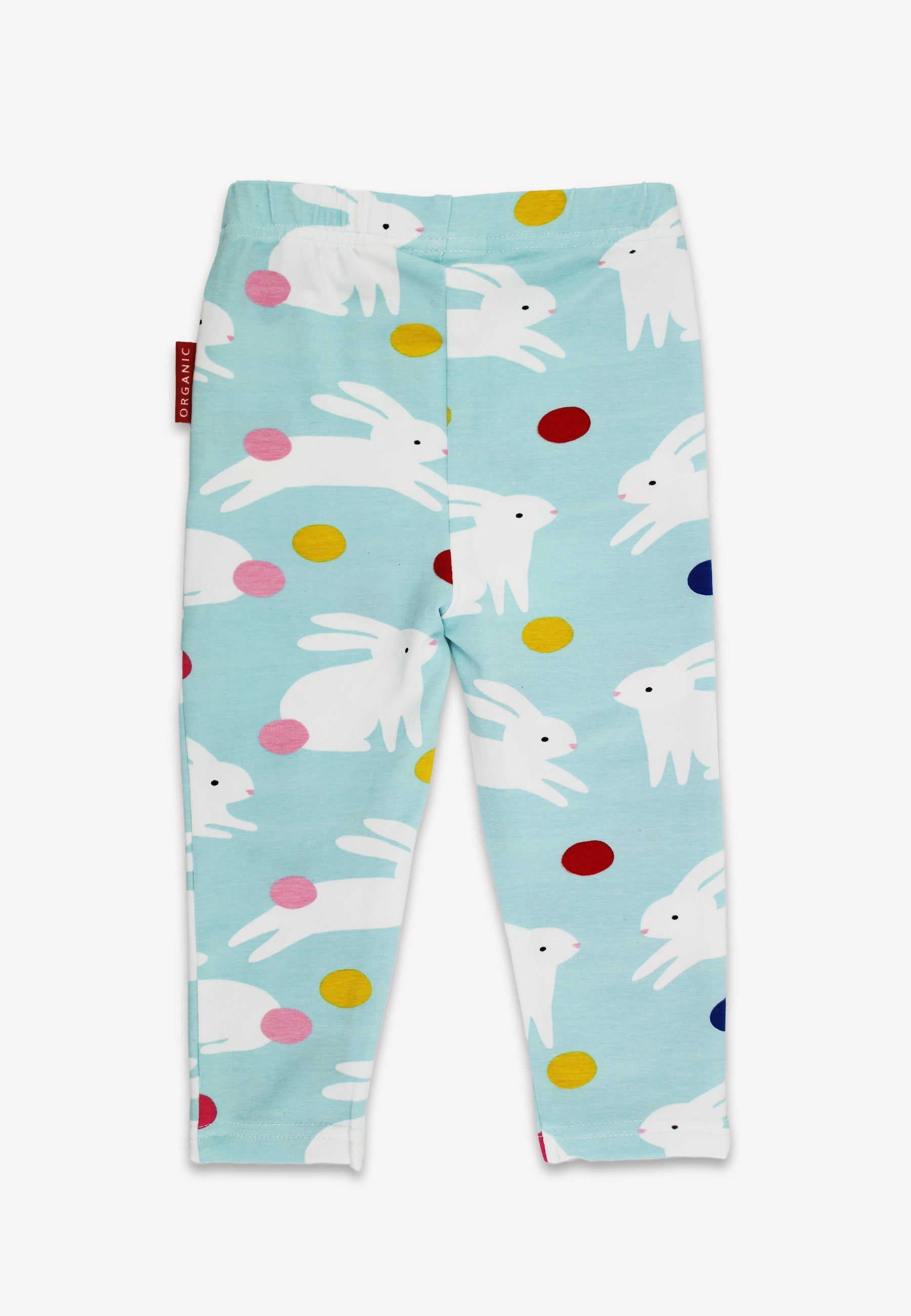 Children's leggings with bunny and egg pattern on a light blue background