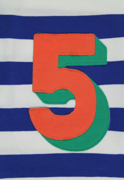Orange and green number 5 on a blue and white striped background