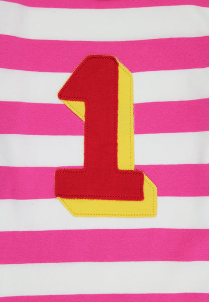 Striped fabric with a red and yellow number '1' on a pink and white background