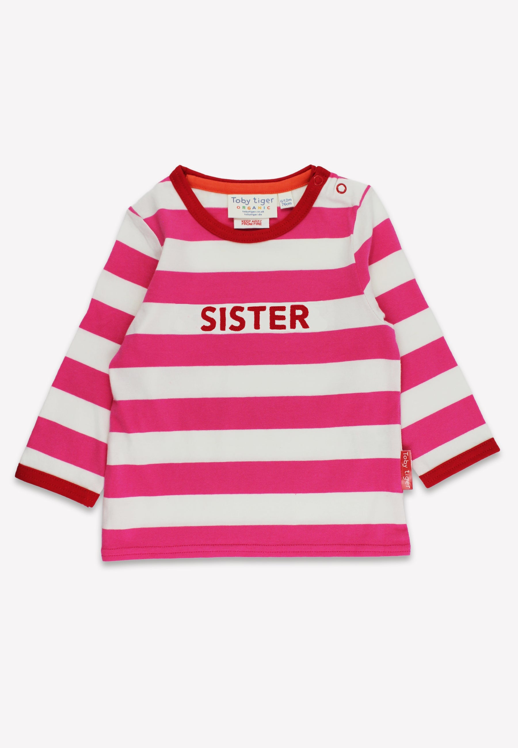 Pink and white striped shirt with 'SISTER' text on a white background