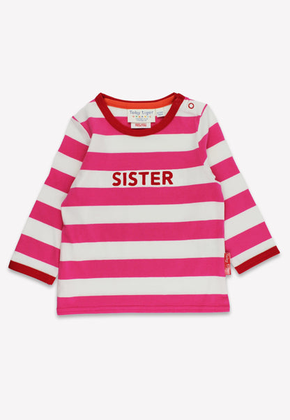 Pink and white striped shirt with 'SISTER' text on a white background