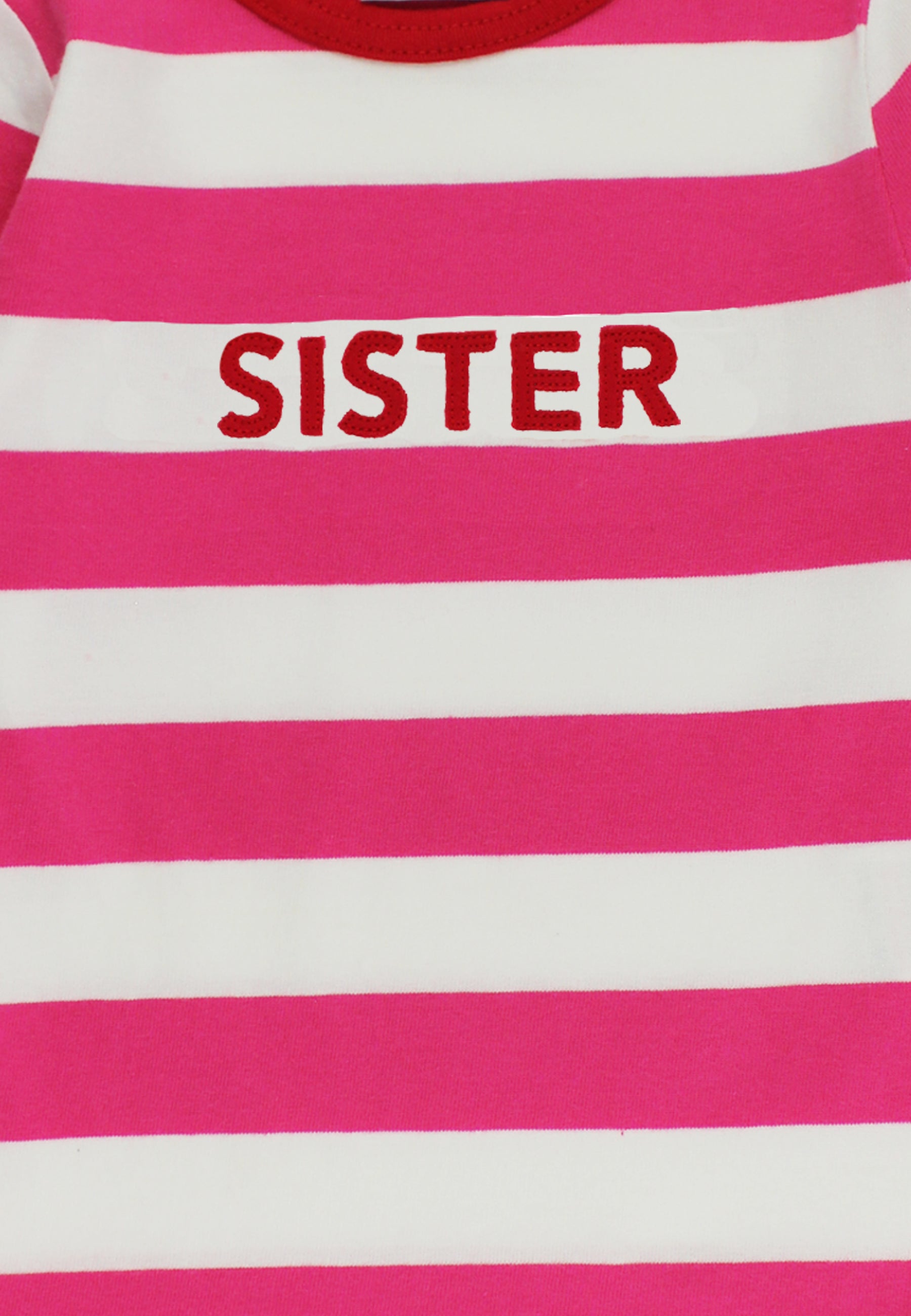 Pink and white striped shirt with 'SISTER' printed on it