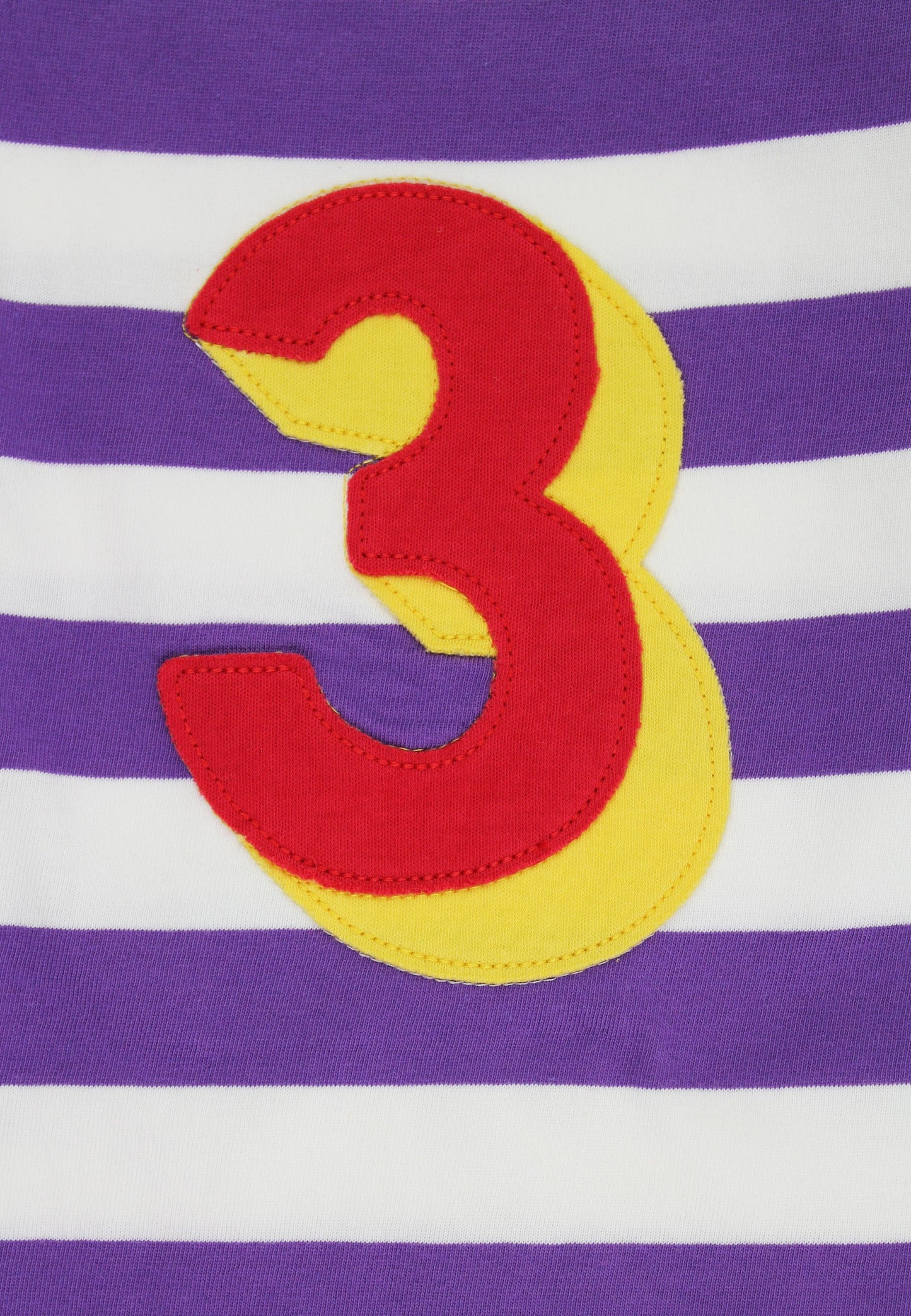 Purple and white striped shirt with a large red and yellow number '3' on a purple background