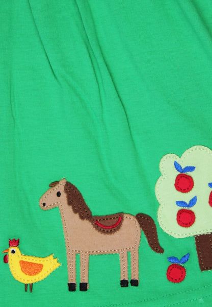 Organic Hillside Applique T-shirt Dress by Toby Tiger, GOTS-certified, vetted by KIDDYKIND
