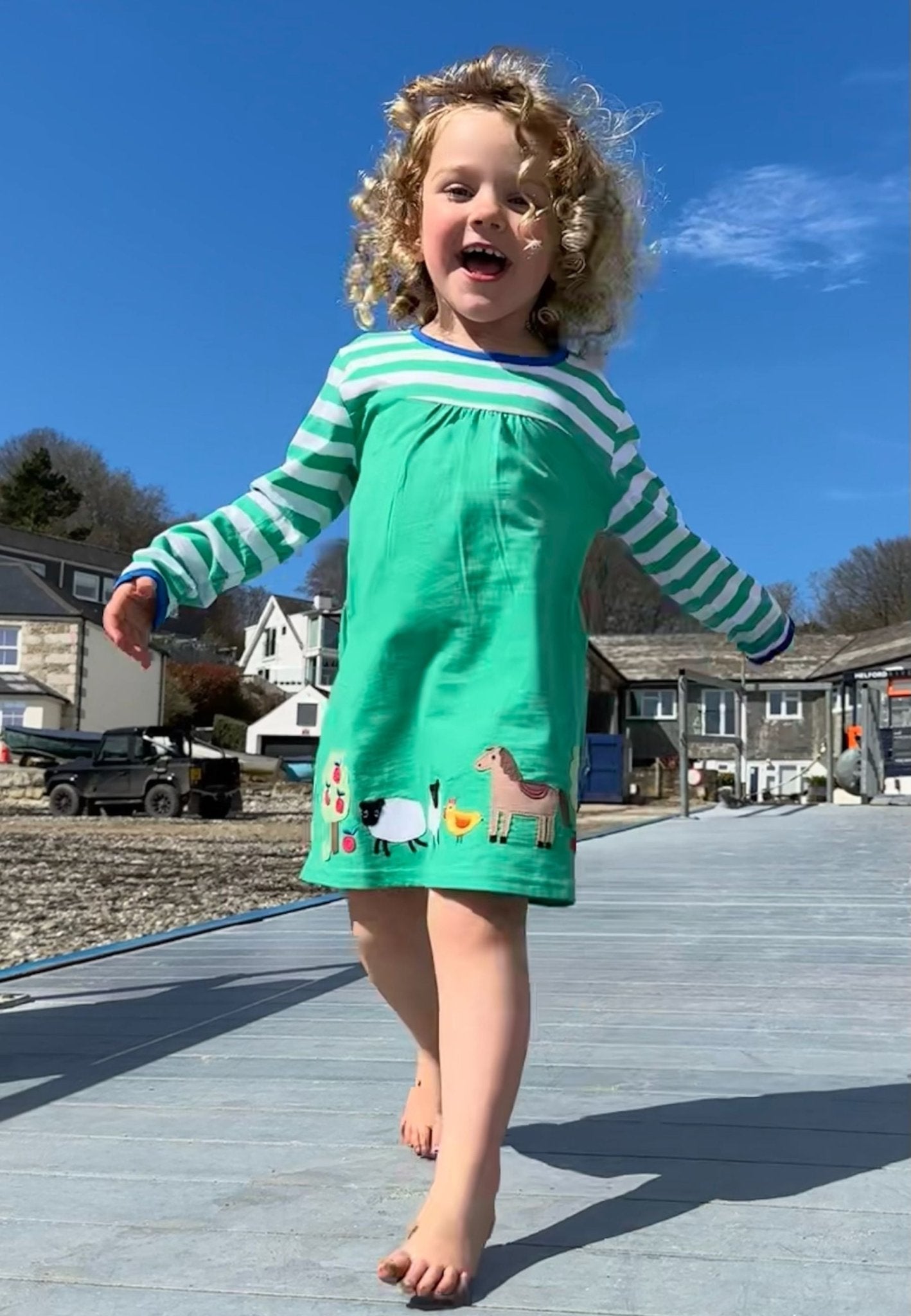 Organic Hillside Applique T-shirt Dress by Toby Tiger, GOTS-certified, vetted by KIDDYKIND