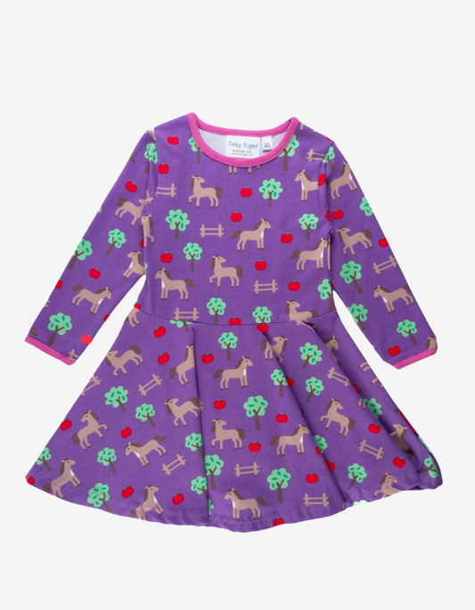 Organic Horse Print Long-Sleeved Skater Dress by Toby Tiger, GOTS-certified, vetted by KIDDYKIND