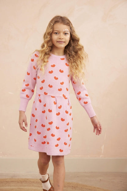Girl wearing the MIKA & MILO Love Hearts Dress in bubble gum pink
