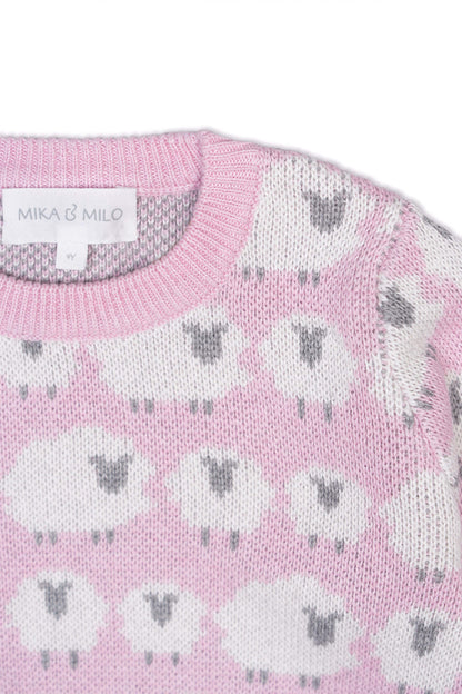 Close-up of the jacquard-knit sheep on the bubble gum pink jumper