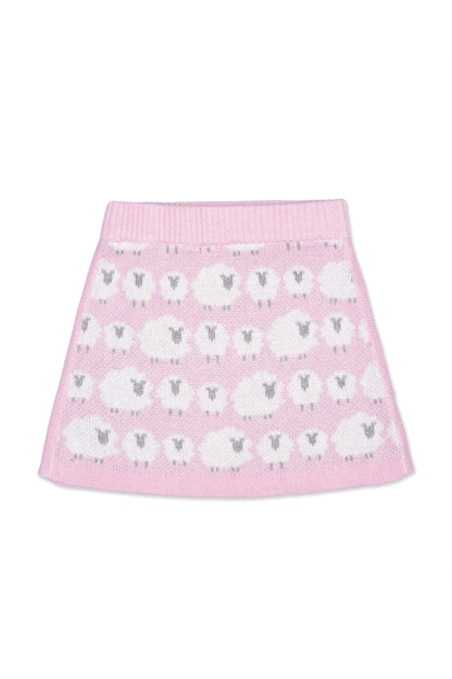 Front view of the Little Bo Peep A-line Skirt in bubble gum pink with rows of cream jacquard sheep
