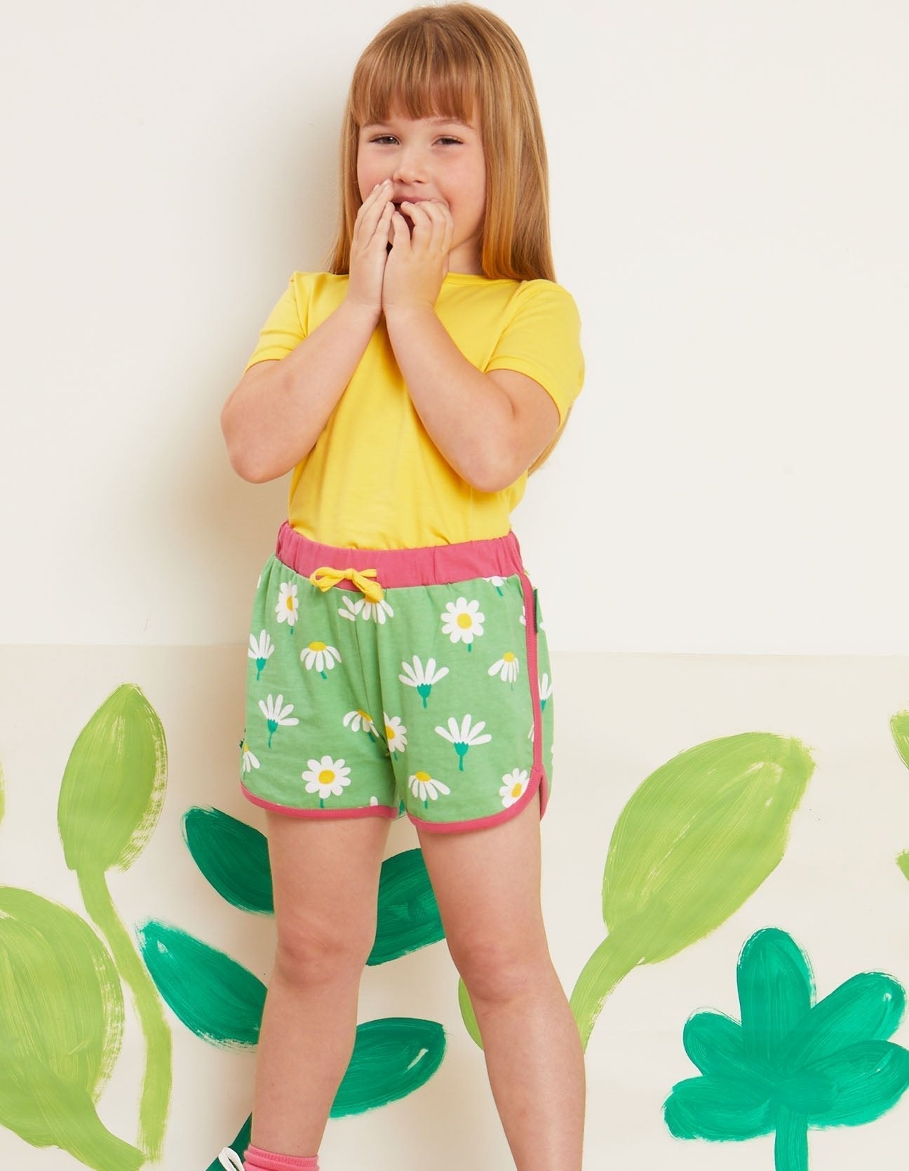 Organic Daisy Print Running Shorts by Toby Tiger, GOTS-certified, vetted by KIDDYKIND