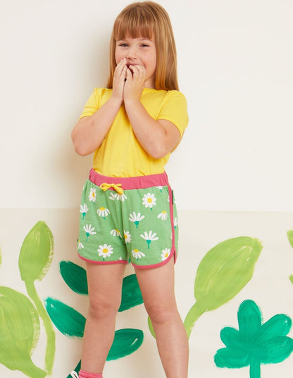 Organic Daisy Print Running Shorts by Toby Tiger, GOTS-certified, vetted by KIDDYKIND