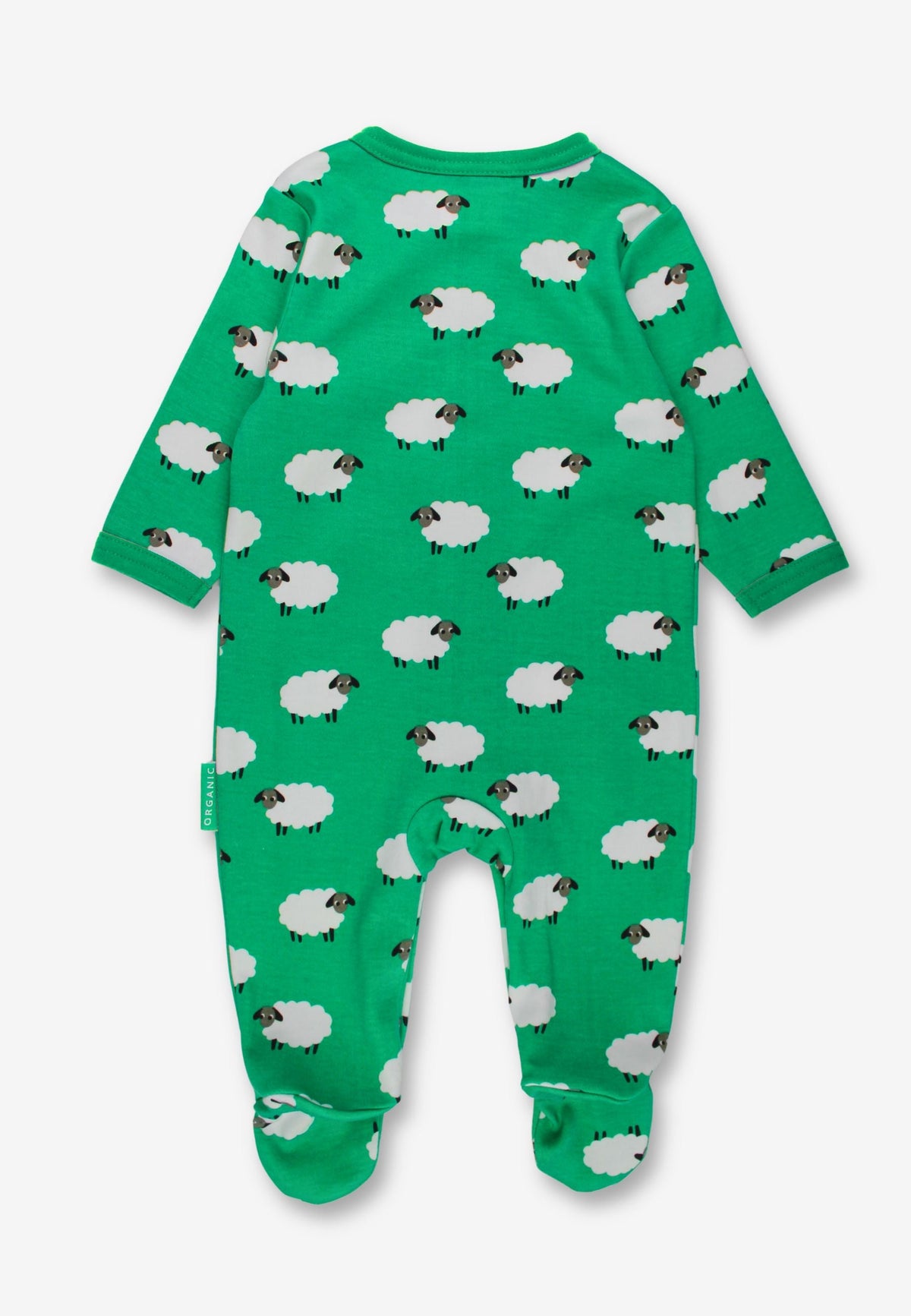 A green baby footed sleeper with an all-over sheep print, shown flat against a light gray background.