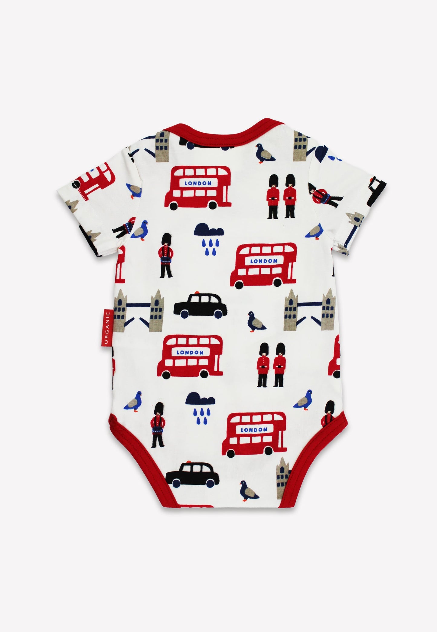 Baby onesie with London-themed print featuring red buses, black cars, and British flags on a white background.