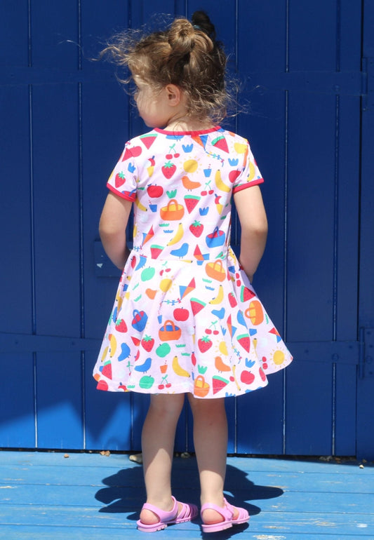 Organic Picnic Print Short Sleeved Skater Dress by Toby Tiger, GOTS-certified, vetted by KIDDYKIND