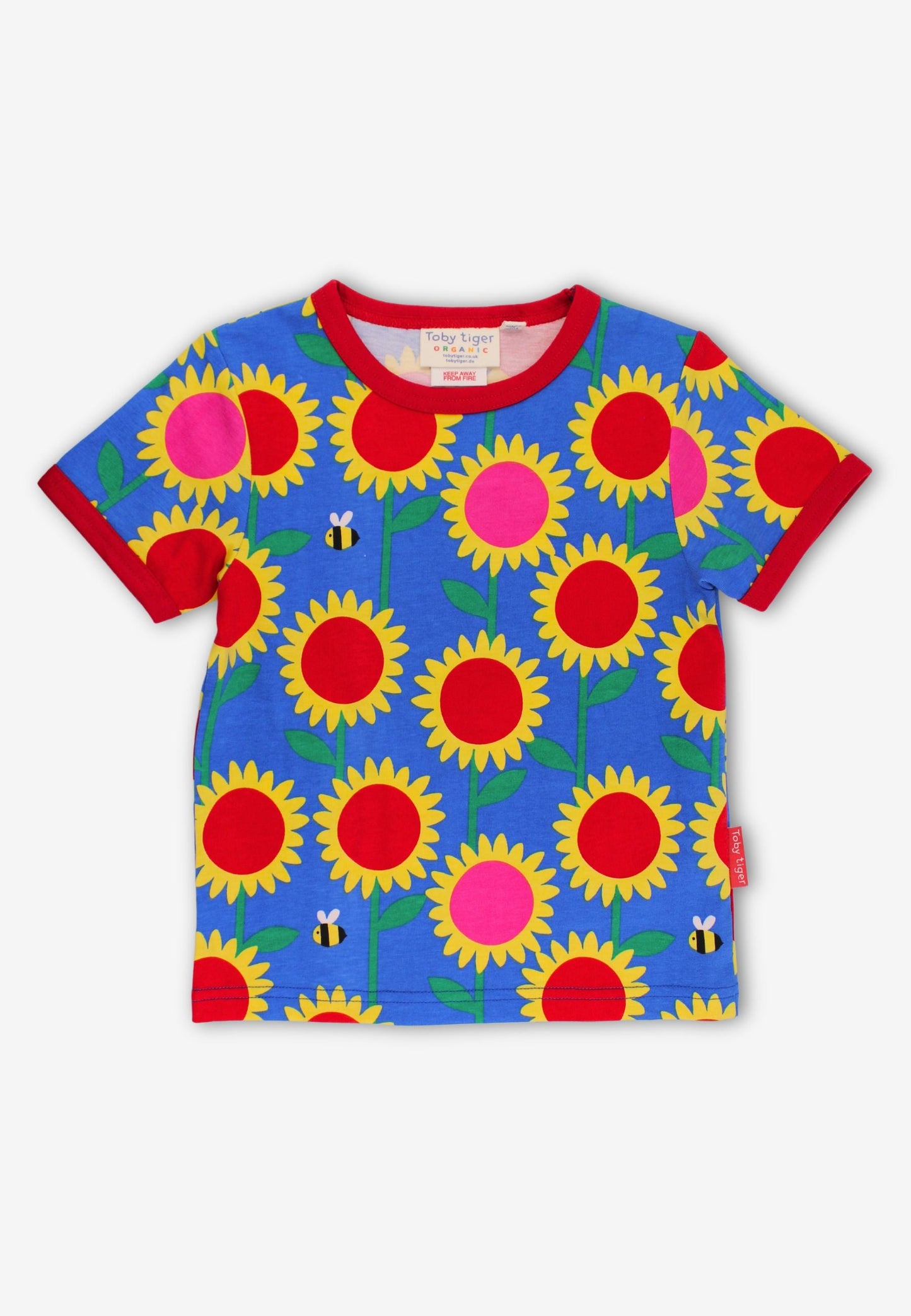 Blue t-shirt with sunflower print and bees, on a white background