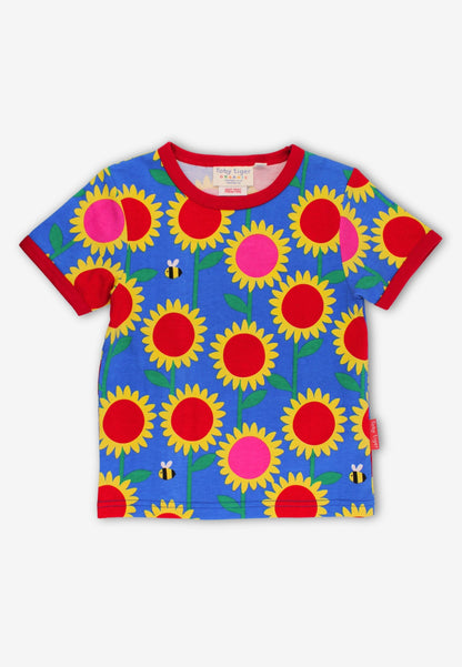 Blue t-shirt with sunflower print and bees, on a white background