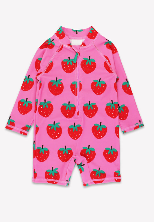 Pink sunsuit with strawberry pattern on a white background