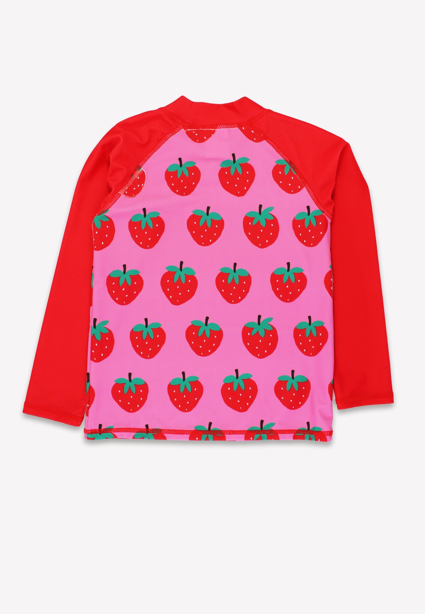 Children's shirt with strawberry pattern on a pink background