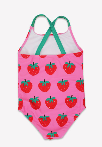 Pink swimsuit with strawberry pattern on a white background