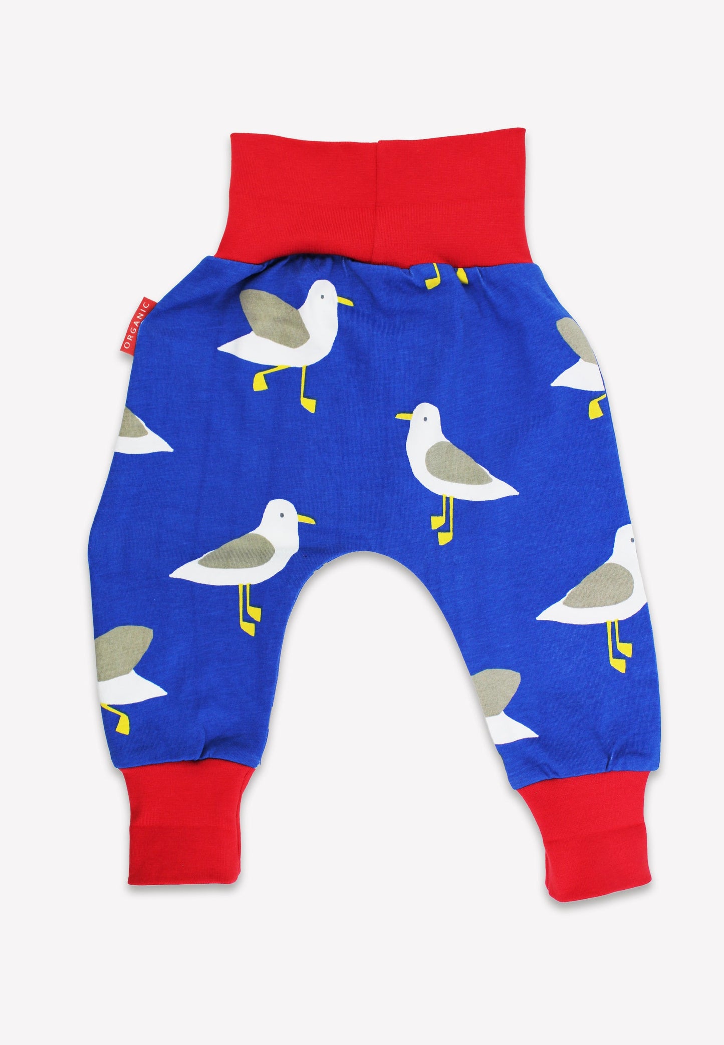 Blue baby pants with seagull pattern and red accents on a white background