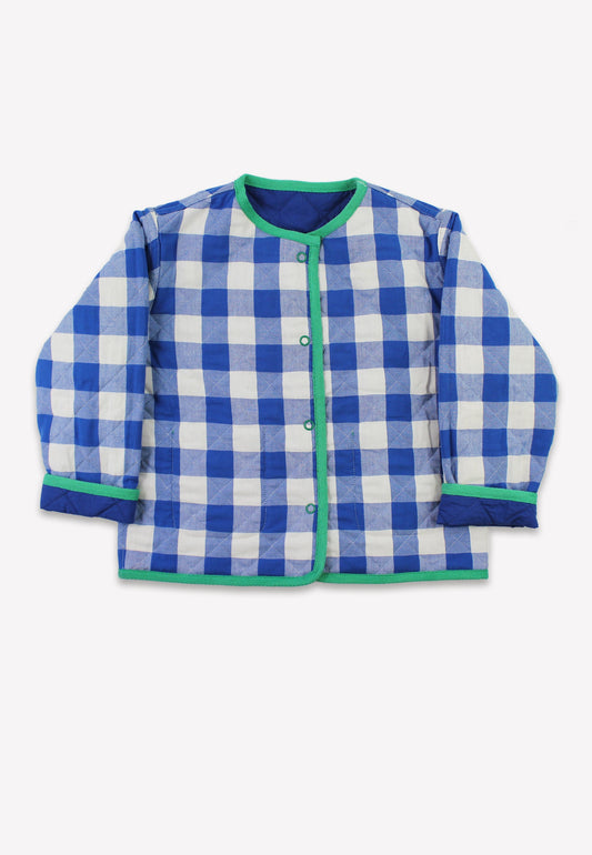 Blue and white checkered jacket with green trim on a white background