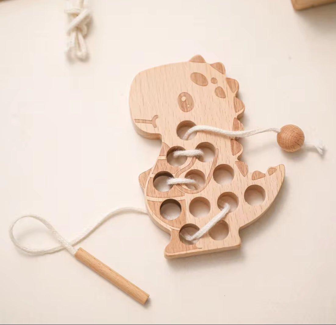 Wooden dinosaur lacing toy with cotton cord, view 3