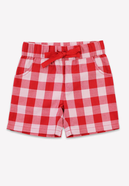 Red and white checkered shorts with a bow on a white background