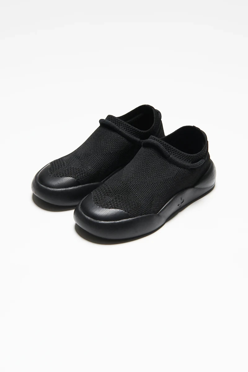 Black-childrens-trainers-made-from-recycled-plastic-sugarcane-sole-top-view