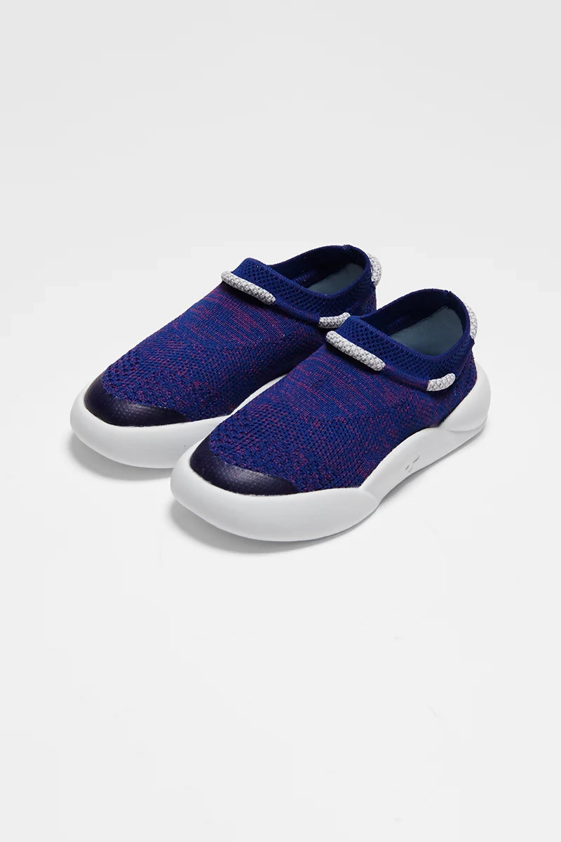 blue-childrens-trainers-made-from-recycled-plastic-sugarcane-sole-top-view