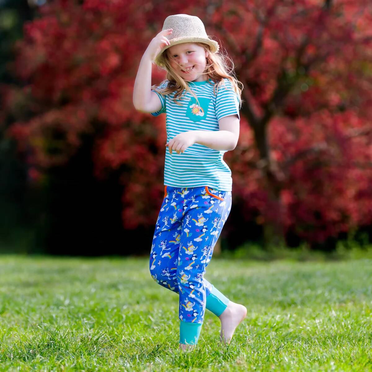 Ducky_Zebra_Unisex_Organic_Cotton_Kids_Baby_Colourful_Clothes_Trousers_Happy_Girl_Outside_1200x.jpg